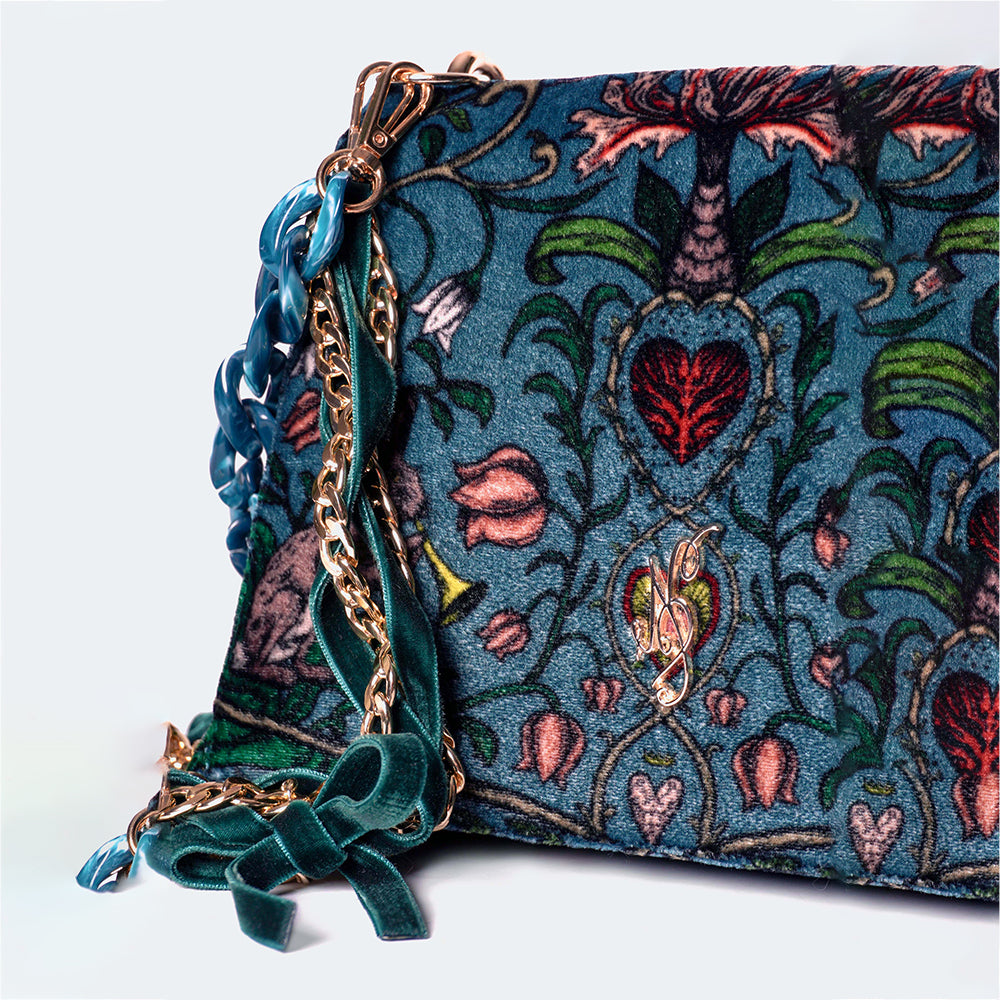 Elevate your style with the Clea Silk Velvet Women's Handbag featuring Mystic Rabbit Print. Carry sophistication. Shop now!