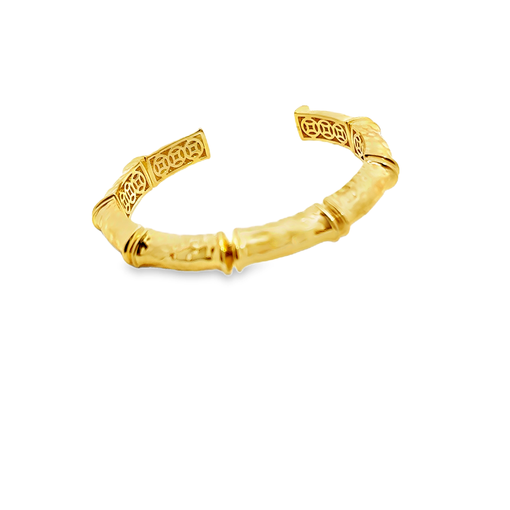 Elegant 22K gold plated cuff bracelet with intricate detailing and an adjustable fit. A timeless statement piece for every occasion. Shop premium jewelry online.