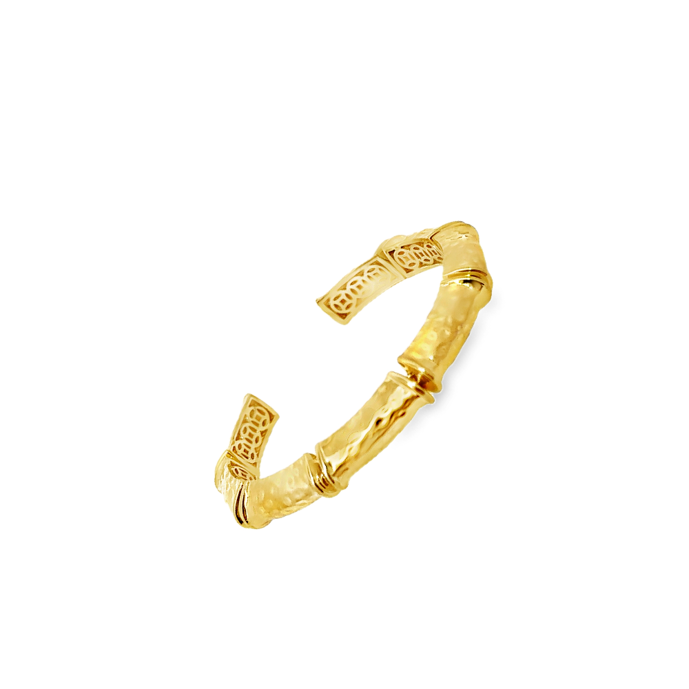 Elegant 22K gold plated cuff bracelet with intricate detailing and an adjustable fit. A timeless statement piece for every occasion. Shop premium jewelry online.
