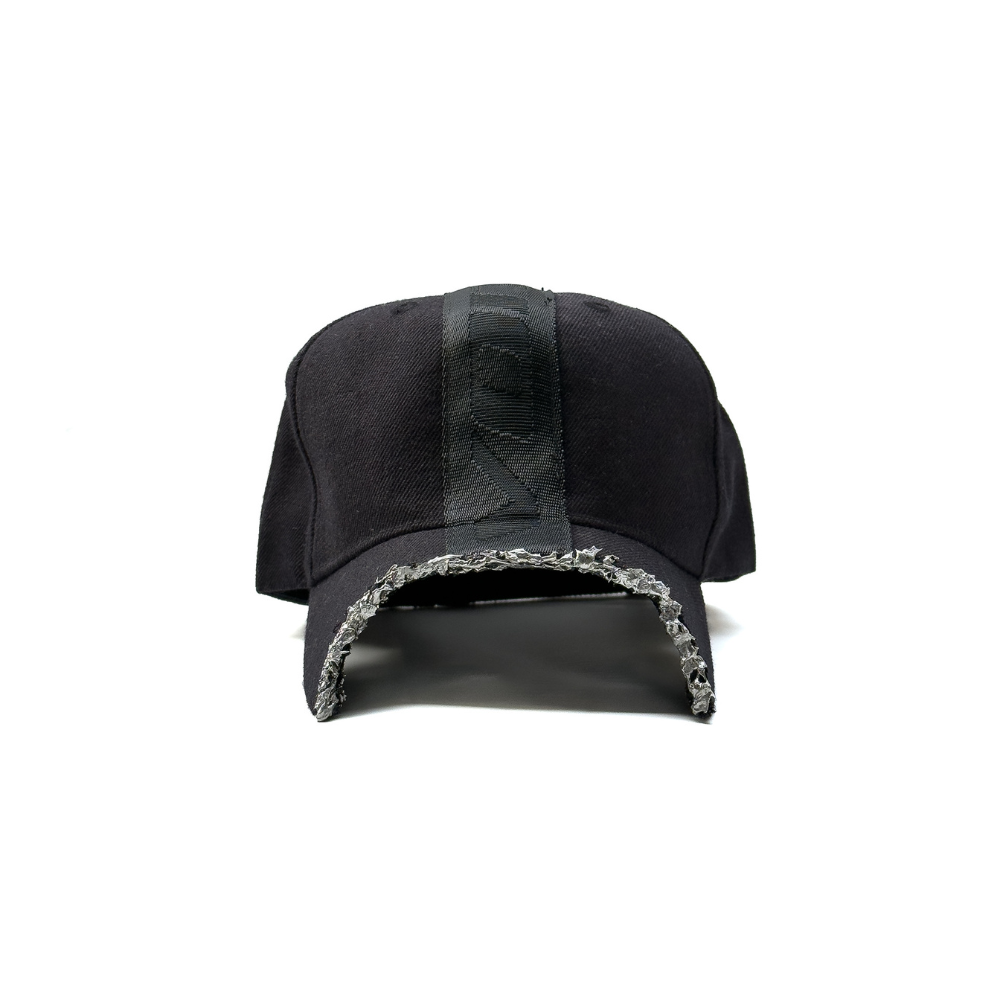 Shop online from our exclusive website and discover the Composite Molten Alloy Cap by Voitech®, featuring heavyweight cotton drill, a hand-applied molten alloy visor, and industrial-inspired technical craftsmanship.