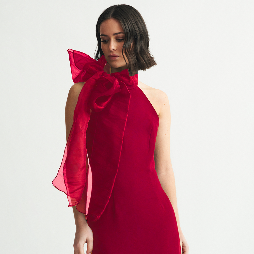 Halter concorde backless dress with removable organza neck scarf. Midi length, perfect for cocktails & for a day-to-night event. Shop now!