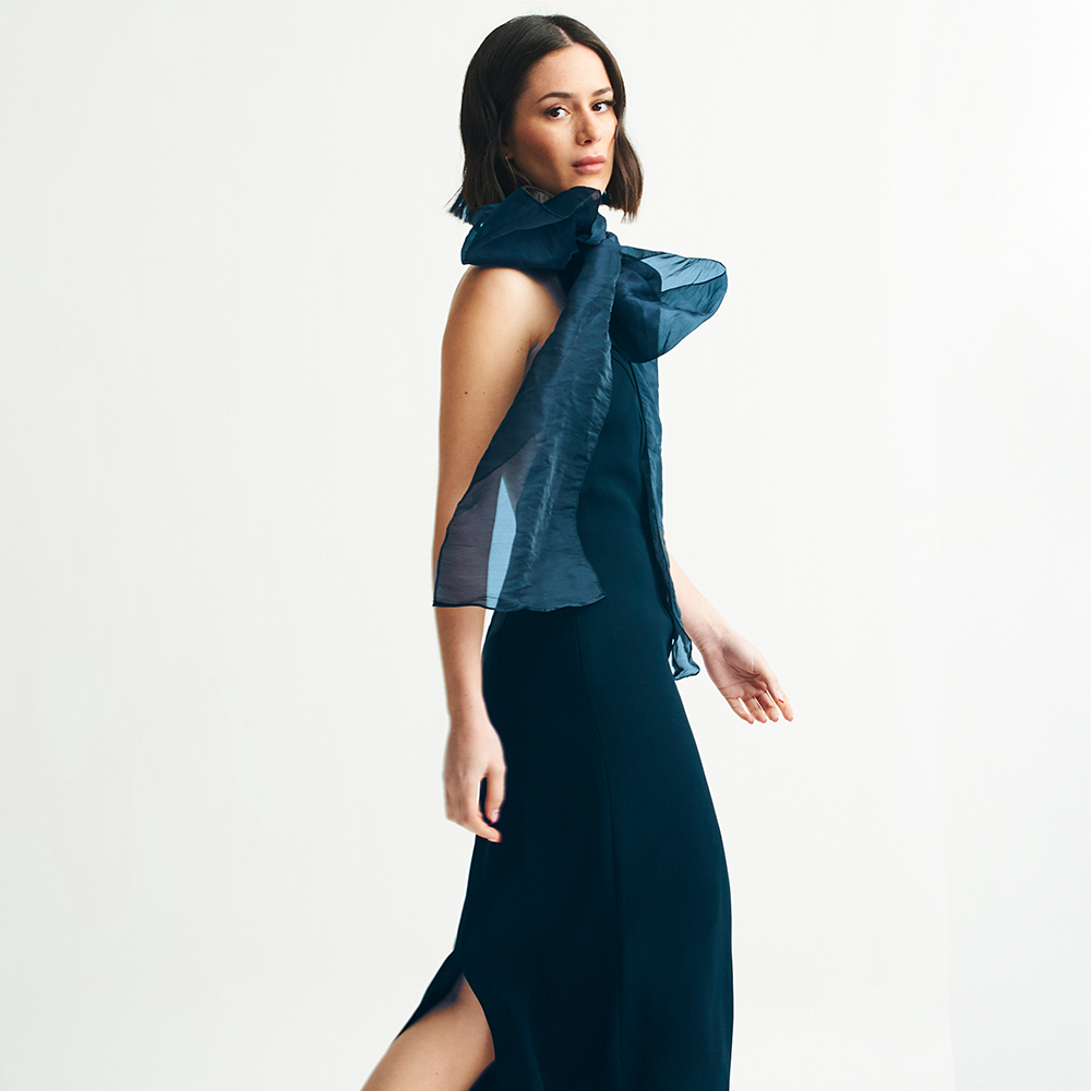 Halter concorde backless dress with removable organza neck scarf. Midi length, perfect for cocktails & for a day-to-night event. Shop now!