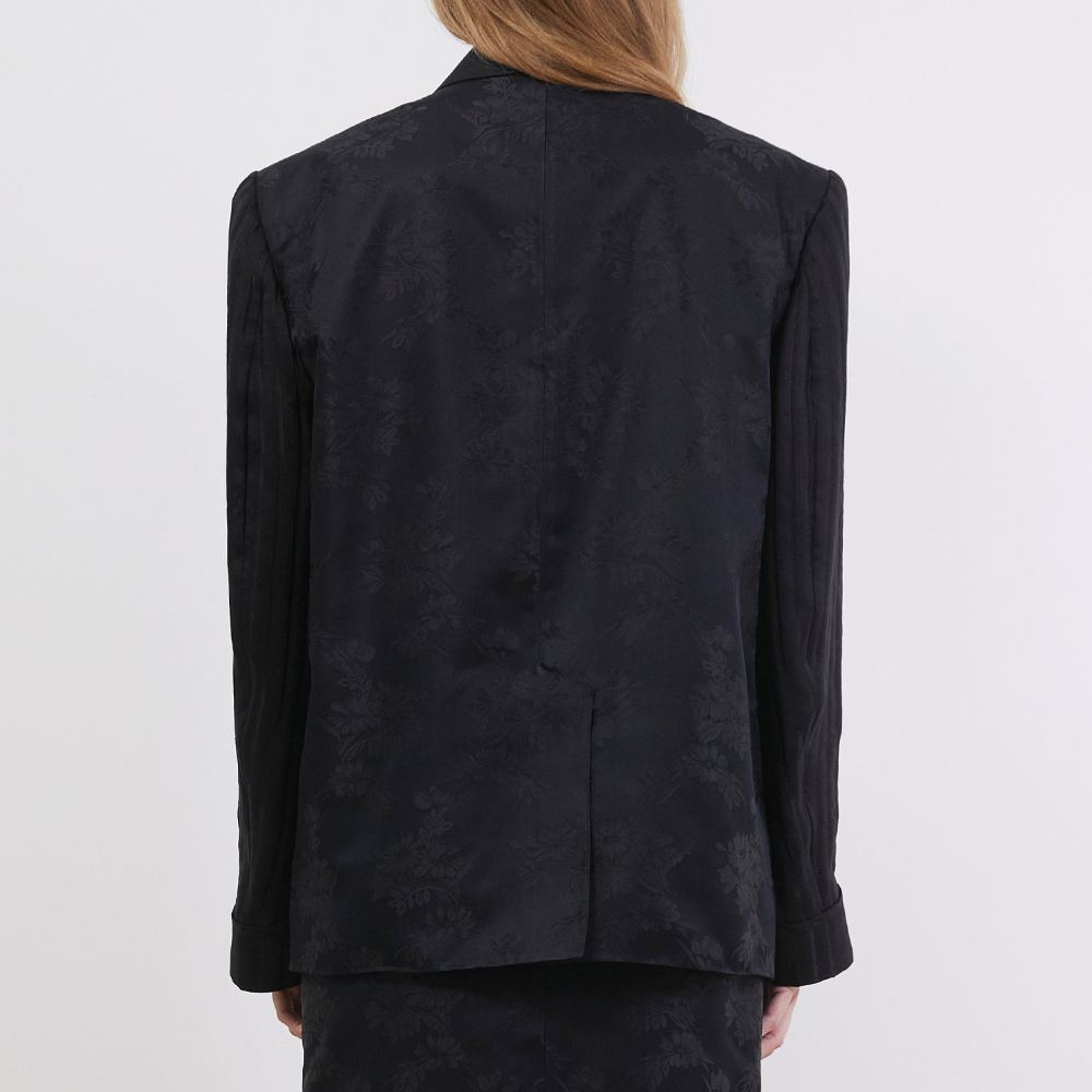 Raw-edged, Round neckline One side handkerchief-hem with patch pocket Adjustable tie belt at waist Relaxed silhouette. 