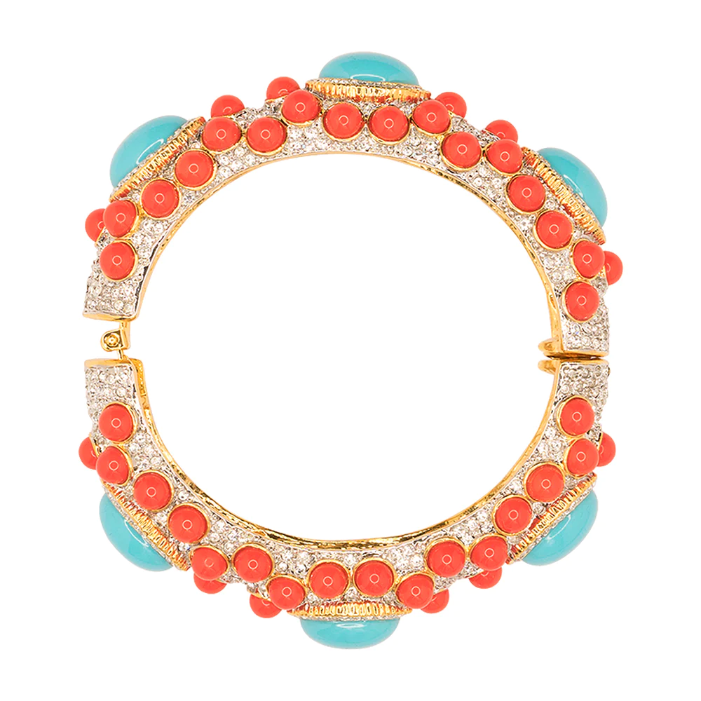 Beads for days with this coral and turquoise bangle. Perfect for stacking or to wear alone. 