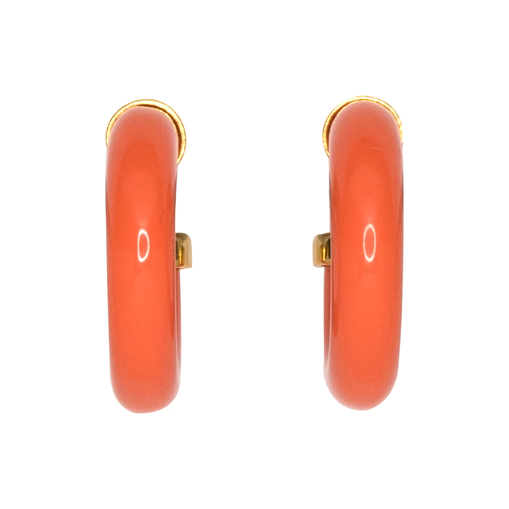 Complete your collection with these coral hoop earrings polished off with gold end caps.