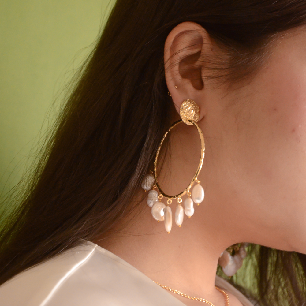 Inspired by the cottonwood trees, these pair of earrings symbolize healing and growth. 