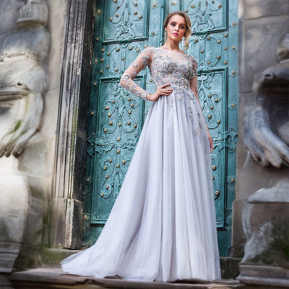 This beautiful grey gown seems to glow in the moonlight; light grey lining brightens this formal dress for a glowing look.