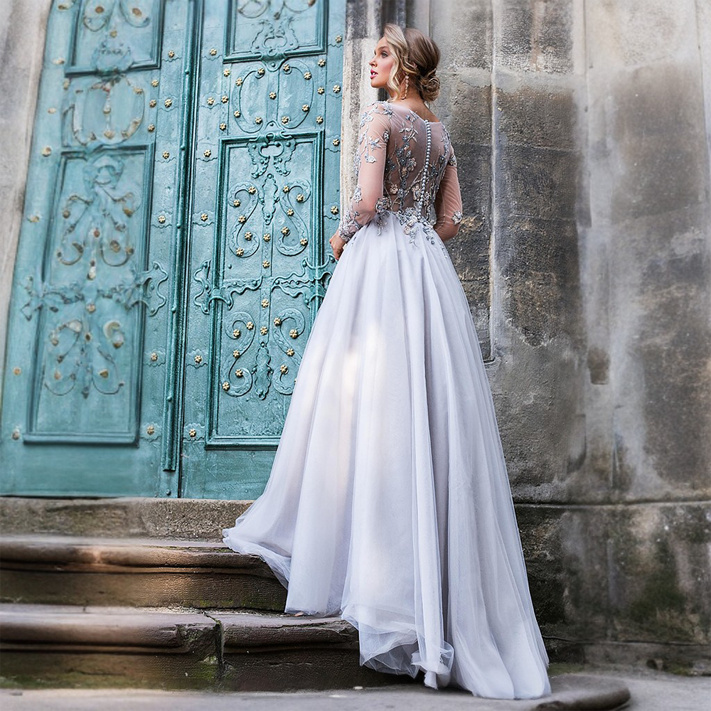 This beautiful grey gown seems to glow in the moonlight; light grey lining brightens this formal dress for a glowing look.