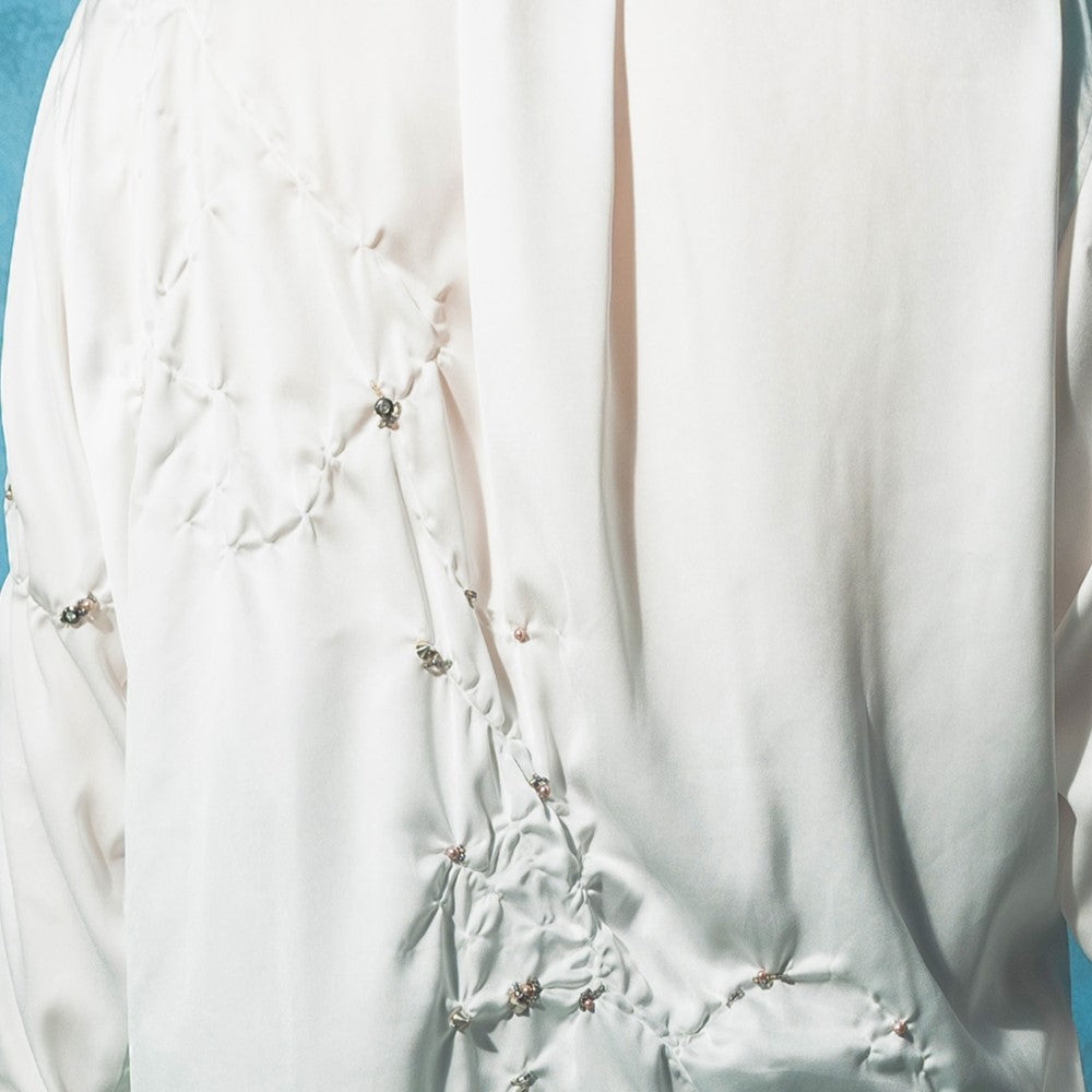 Beautiful dresses for women in Couture White Wrinkled Shirt. Shop Now!