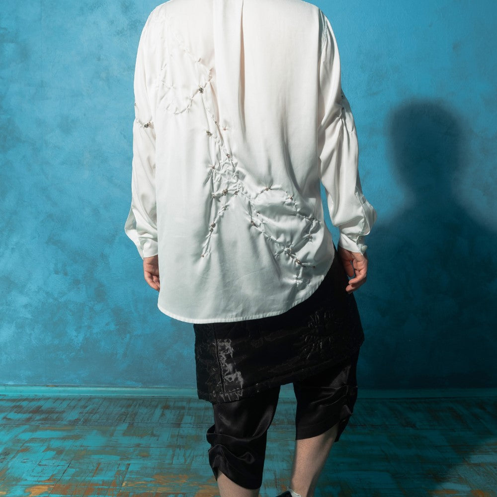 Beautiful dresses for women in Couture White Wrinkled Shirt. Shop Now!