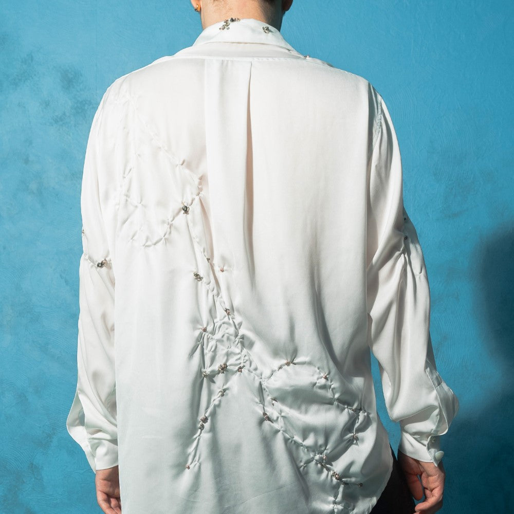 Beautiful dresses for women in Couture White Wrinkled Shirt. Shop Now!