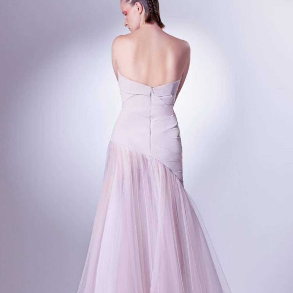 This dress is designed in nude pink, the geometrical construction is composed of multiple layers of crepe and organdie.