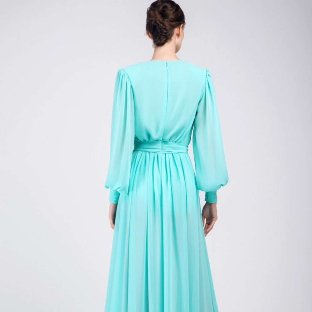 This gown is floor length, pastel green color, long puff sleeves party wear. 