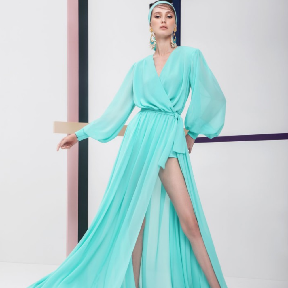 This gown is floor length, pastel green color, long puff sleeves party wear. 