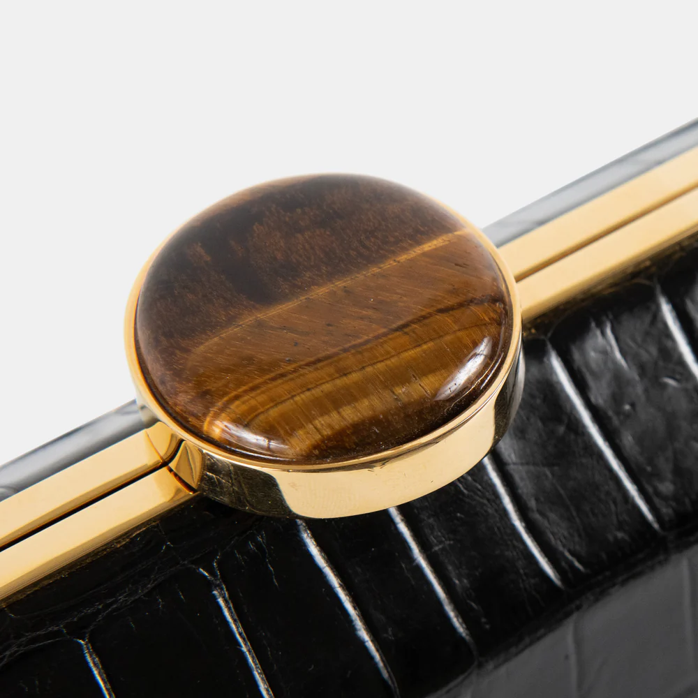 The bezel mounted closure features rare semi-precious stone and 18k gold plated brass hardware.