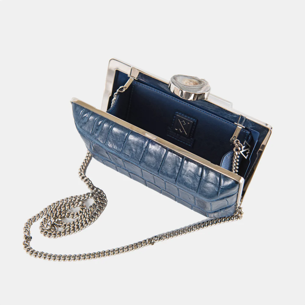 Exclusive NS by Noof collection on The Luxe Maison. This beautiful, caiman skin, brass plated bag with turquoise stone.