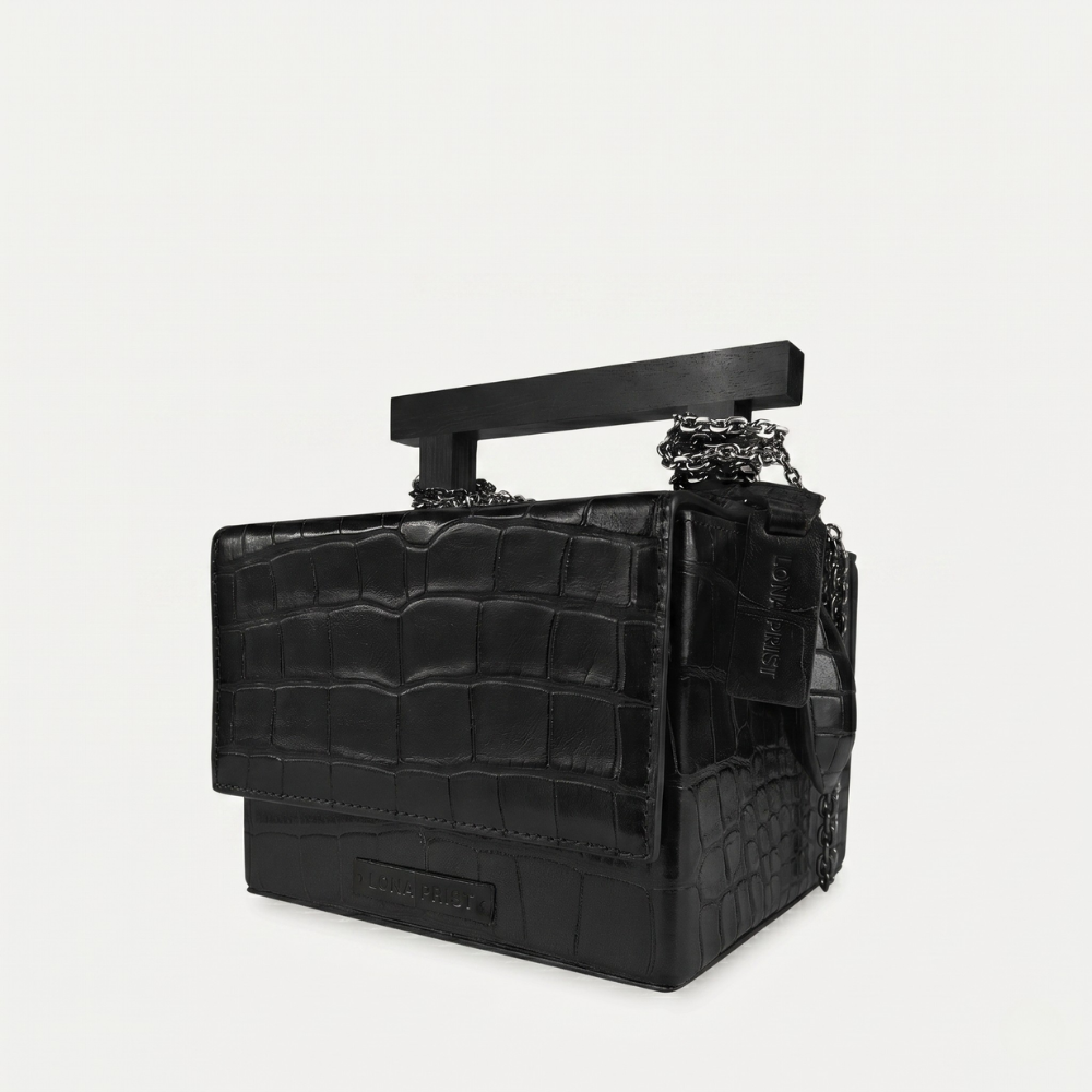 Croc leather handbag with chain handles and magnetic closure, pre order item. Shop online from our curated edit of premium fashion.