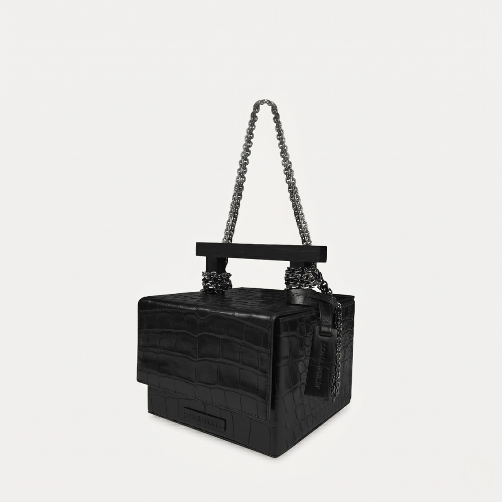 Croc leather handbag with chain handles and magnetic closure, pre order item. Shop online from our curated edit of premium fashion.