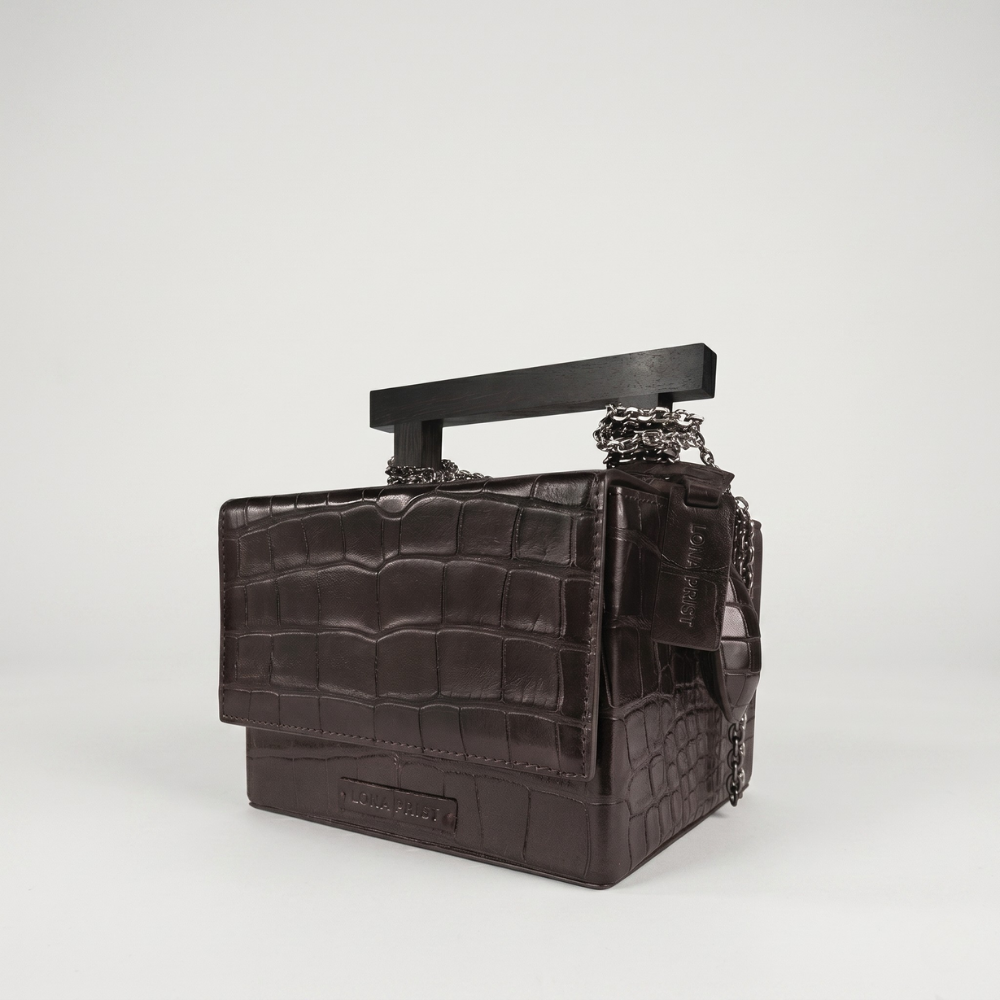 Croc leather handbag with chain handles and flap closure, pre order item. Shop online from our curated edit of premium fashion.