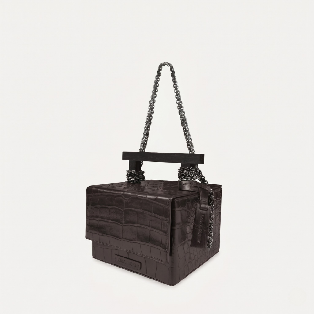 Croc leather handbag with chain handles and flap closure, pre order item. Shop online from our curated edit of premium fashion.