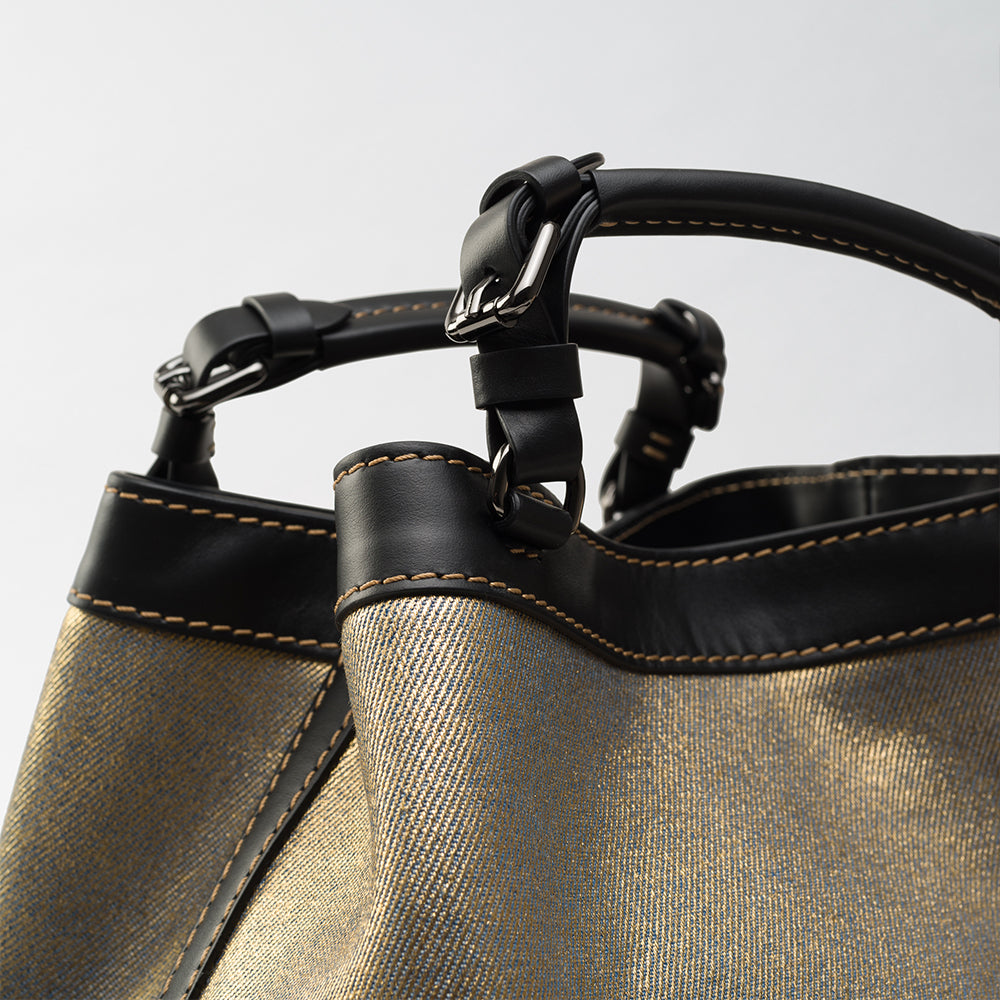 Upgrade your style with the Cubo Amlach Gold Denim handbag. Perfect for any occasion! Shop Now!