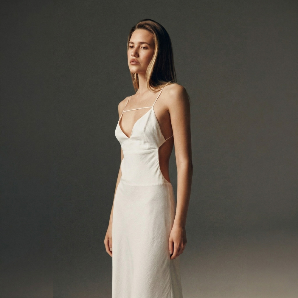 Lightweight dress with a beautiful open back for an effortless, elegant look. Shop now at our exclusive clothing website.