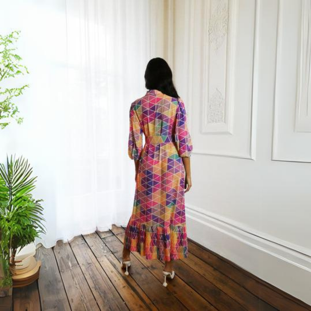 A multi colored abstract print crepe maxi dress with high collar and detachable belt. 