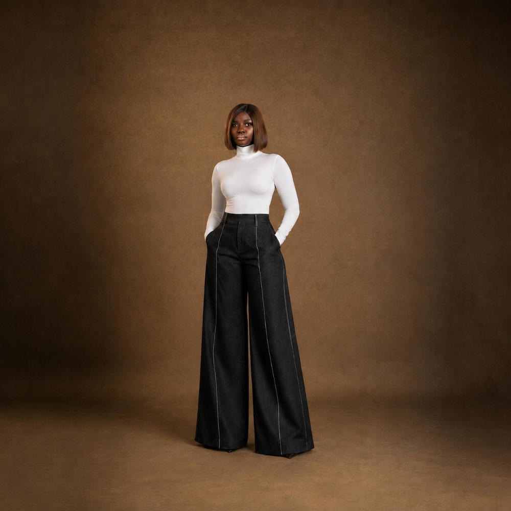 Shop online from our exclusive website. Discover the DOMINA wide palazzo denim pant featuring a floor-grazing silhouette, contrast panel detailing, and precision tailoring for a bold, contemporary statement.