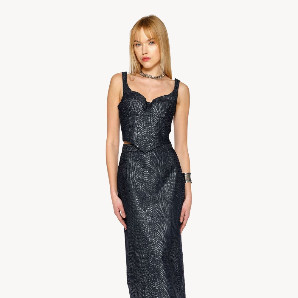Shop online from our exclusive website. Discover the Denim Snakeskin Strap Corset, a fitted denim corset with embossed snakeskin print for a bold, elevated look.