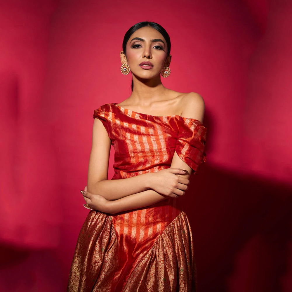 Brocade silk off shoulder dress with ruched sides, perfect for parties and events. Shop online from our curated edit of premium fashion.