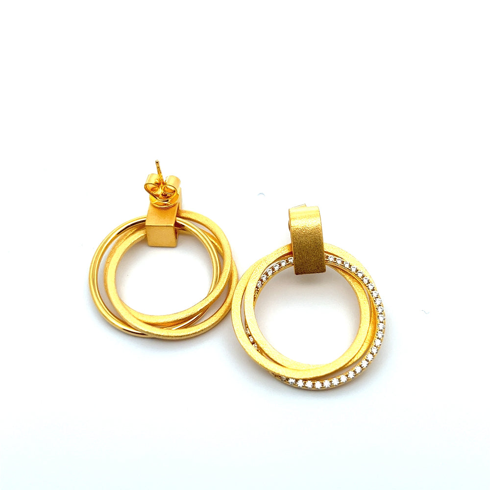 Shop online premium 18K gold geometric drop earrings with sparkling cubic zirconia accents.