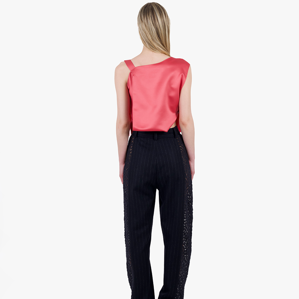 Shop Grace Weller's draped top with leather button. Stylish women’s clothing from a top clothing brand. Perfect for your shopping website. Shop now!