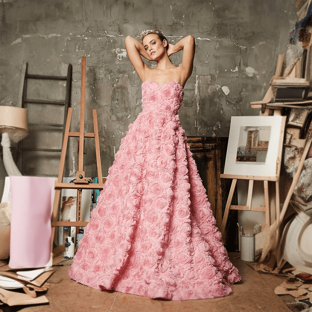 “Florence” is a evening dress that provides a romantic flair due to it being adorned by pink roses.