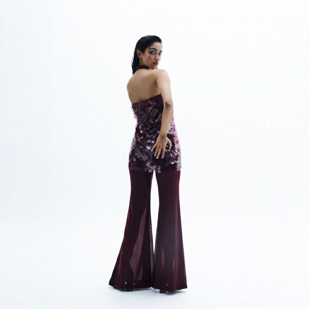 Sequin halter top with flared pants and water sequin detail, perfect for vacations. Shop online from our exclusive collection of premium styles.