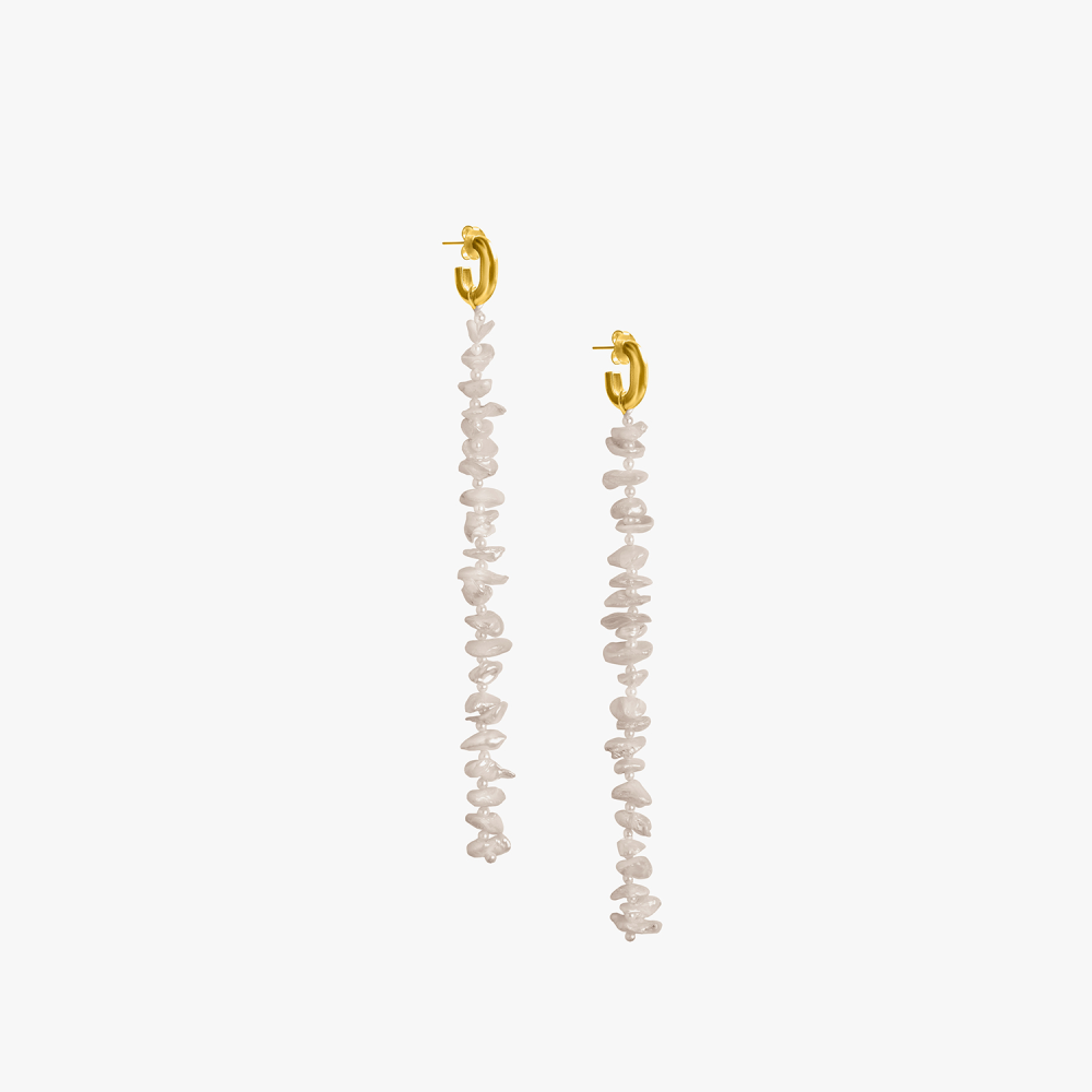 These pearly earrings are inspired by the long dangling vines resembling connection and bond.
