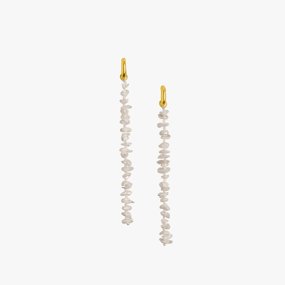 These pearly earrings are inspired by the long dangling vines resembling connection and bond.