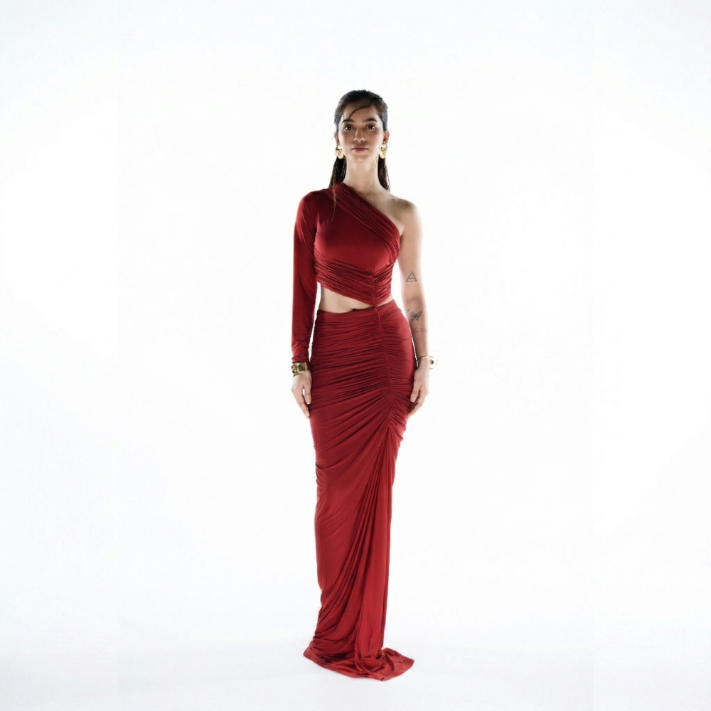 Red one shoulder ruched dress with attached skirt, perfect for parties and events. Shop online from our exclusive collection of premium evening wear styles.