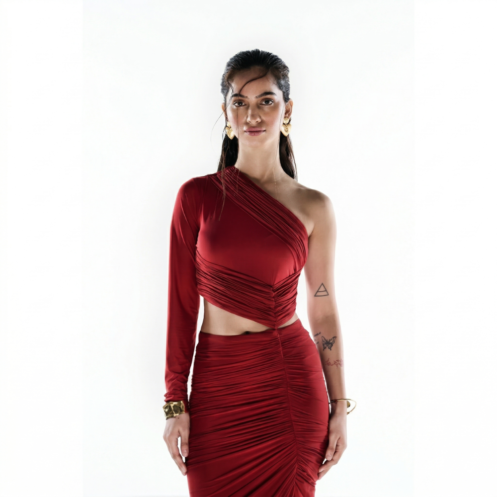 Red one shoulder ruched dress with attached skirt, perfect for parties and events. Shop online from our exclusive collection of premium evening wear styles.