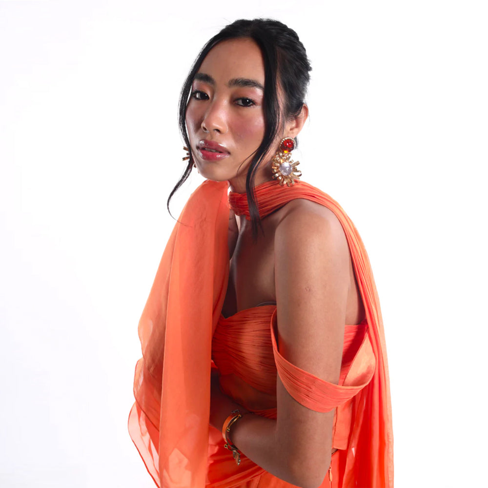 Sheer set with sweetheart top, drape and slit, perfect for events. Shop online from our curated edit of premium fashion.