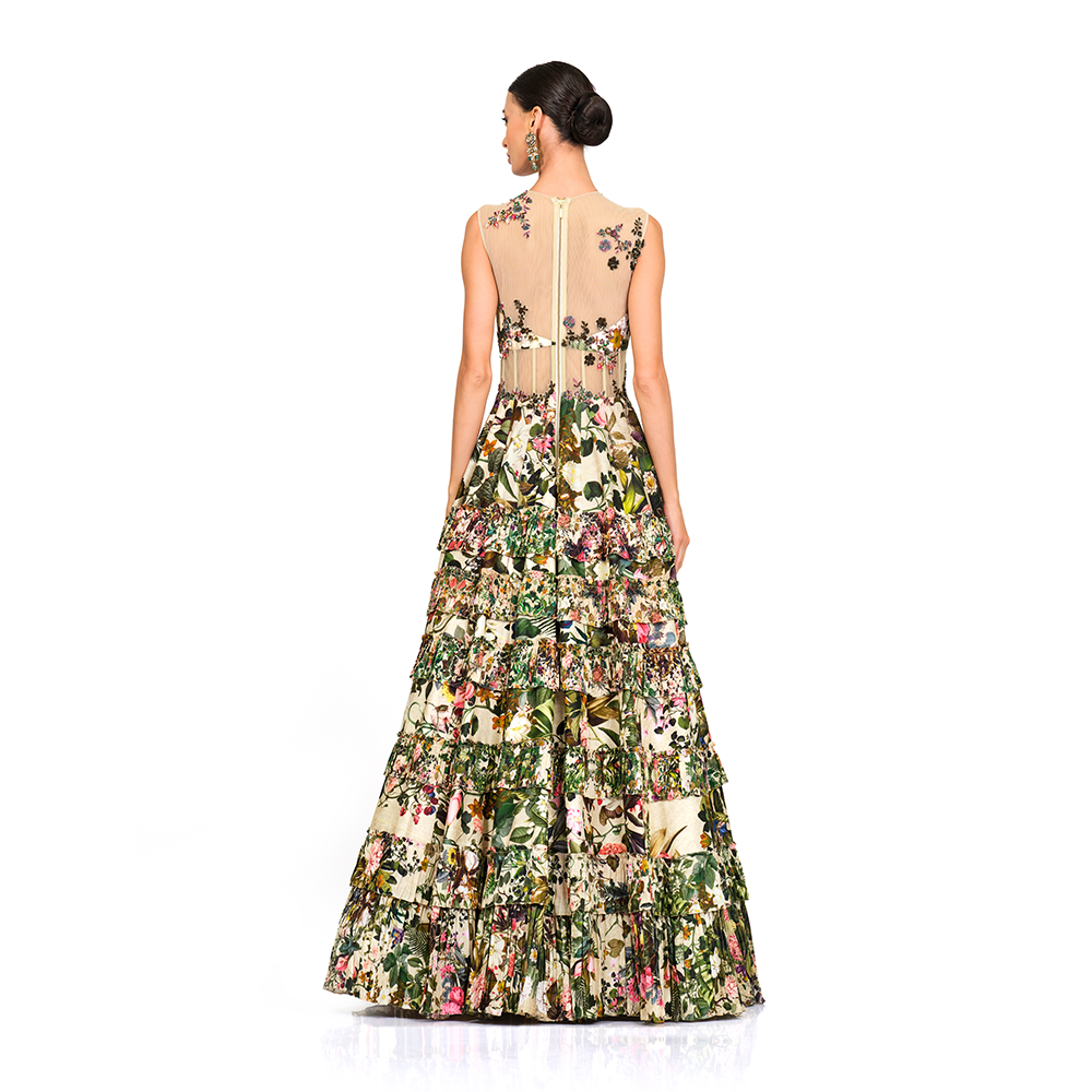 Net embroidered bodice l Floral print gown l Centre back zip closure l Frill bottom.