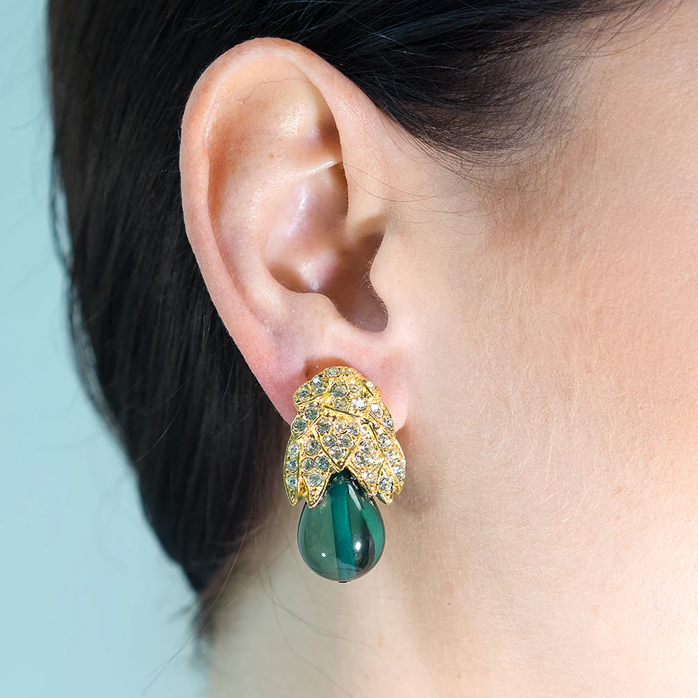 Keep up with the Kennedy's in these gold and crystal pave with an emerald pear shaped resin drop earrings. 