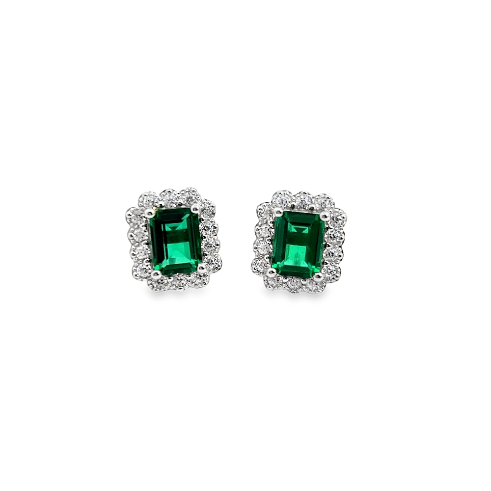 Shop online premium sterling silver emerald stud earrings with sparkling cubic zirconia stones.