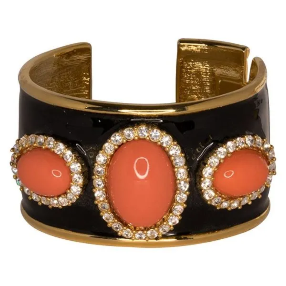 Make a statement like no other with this dramatic and colorful cuff. Gold plated cuff.