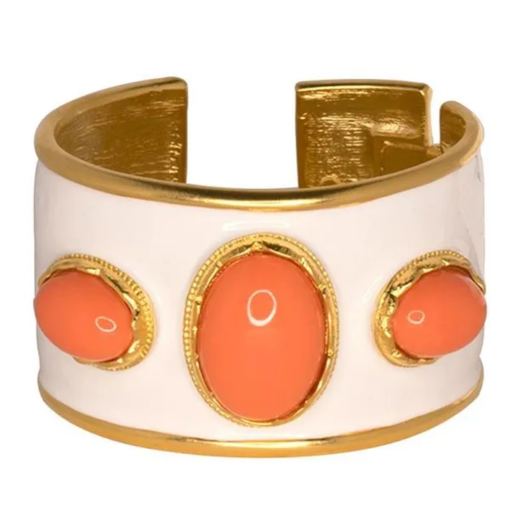 Make a statement like no other with this dramatic and colorful cuff. Gold plated cuff.