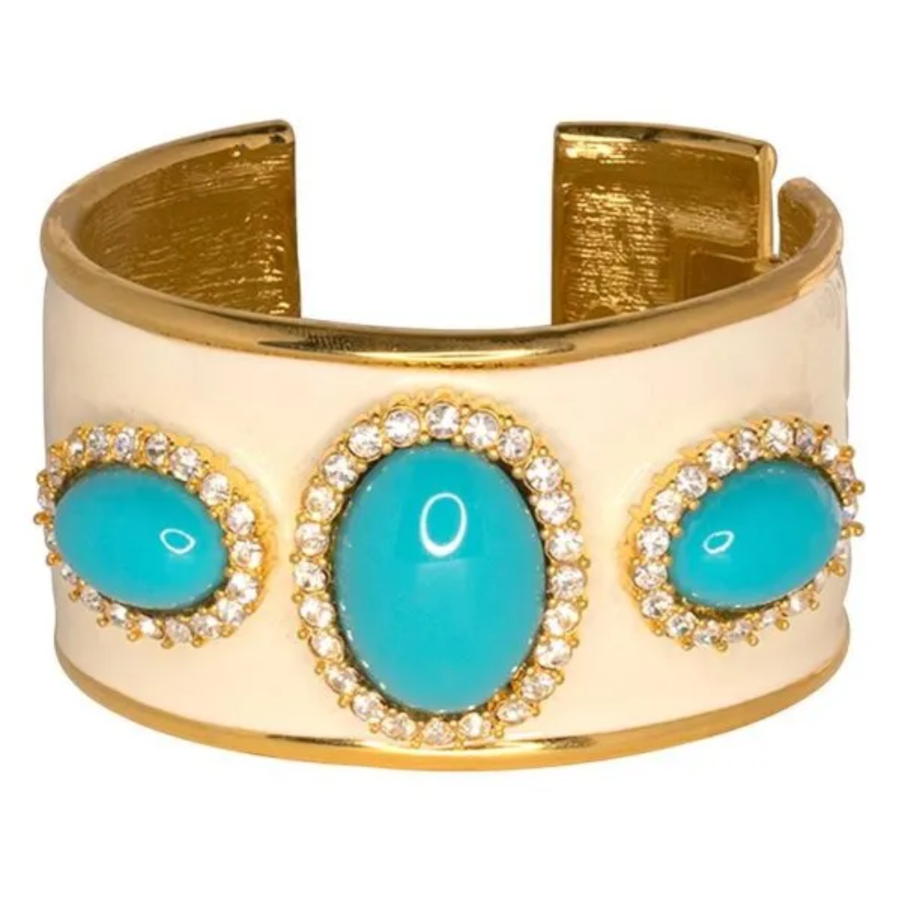 Make a statement like no other with this dramatic and colorful cuff. Gold plated cuff.