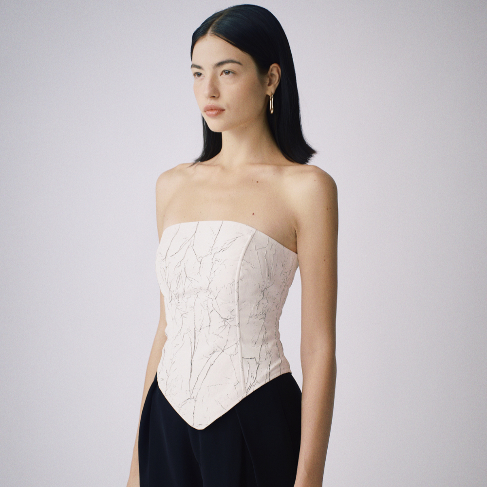 Epiphani Corset blends cotton charm and designer shopping. Shop Now!