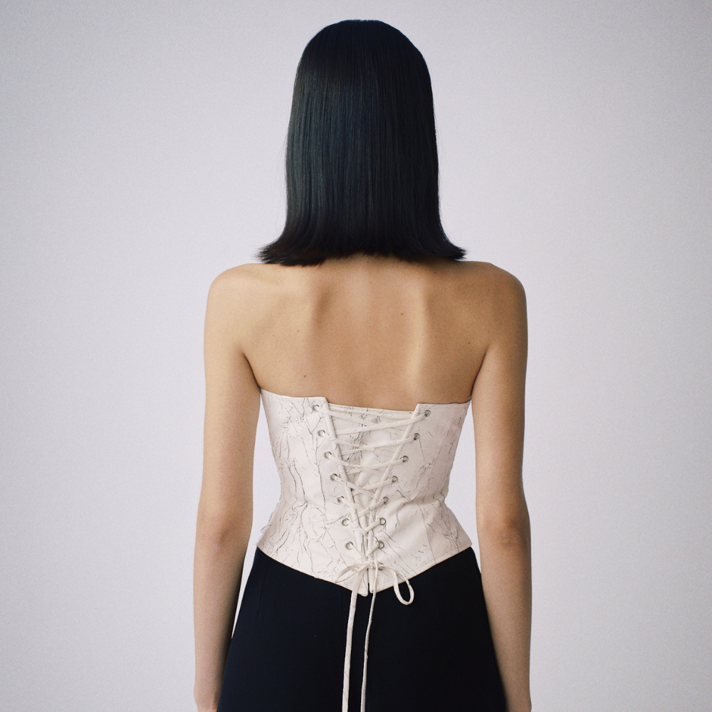 Epiphani Corset blends cotton charm and designer shopping. Shop Now!