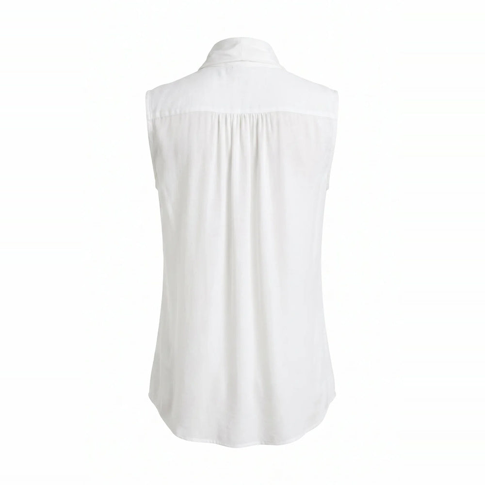 Shop online from our exclusive website and discover the Eucalyptus Scarf Sleeveless Shirt, crafted from soft eucalyptus silk for breathable comfort, fluid drape, and modern minimalist style.