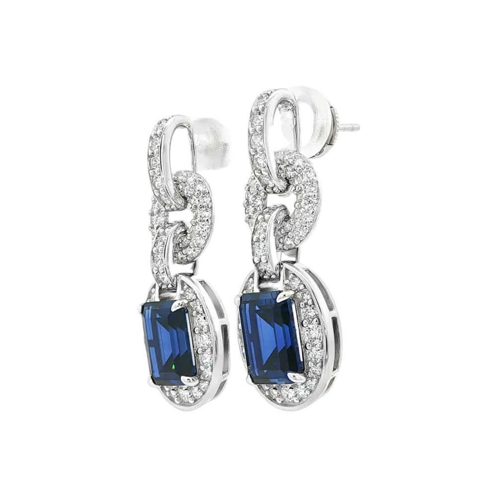 Shop online premium sterling silver blue sapphire dangle earrings with sparkling cubic zirconia stones.