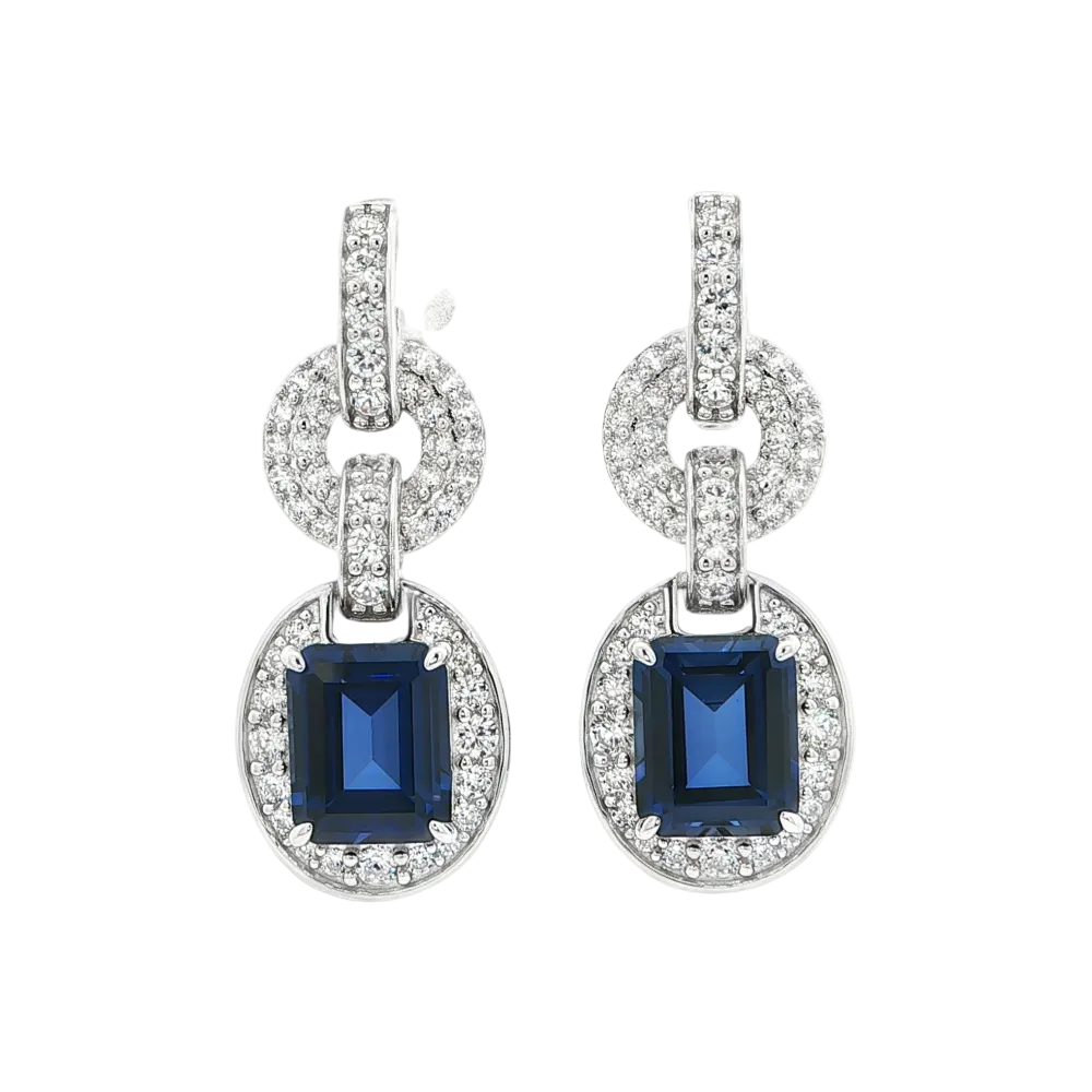 Shop online premium sterling silver blue sapphire dangle earrings with sparkling cubic zirconia stones.